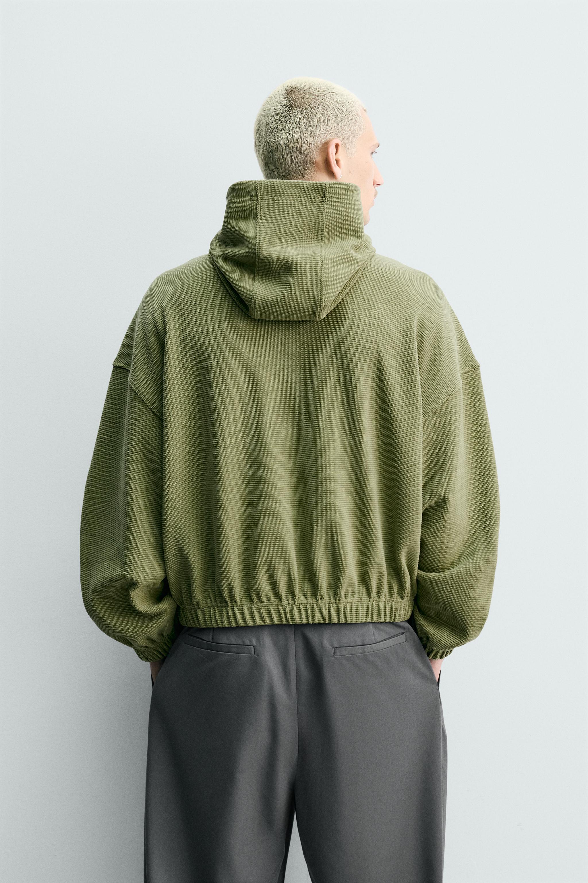BLOUSON WAFFLE DÉLAVÉ À CAPUCHE